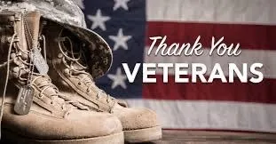 Thank You Veterans graphic with American flag and combat boots from Summit Exteriors of Mechanicsville, MD